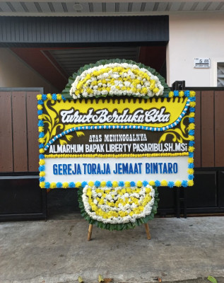 Papan Bunga Duka di Molinow