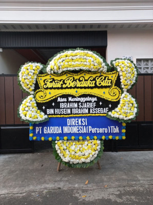 Papan Bunga Duka di Molinow