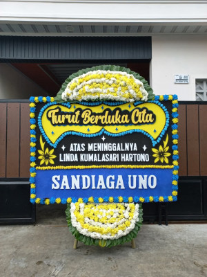 Papan Bunga Duka di Molinow