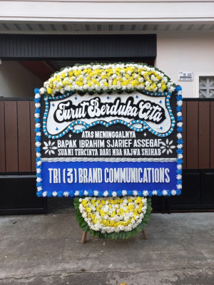 Papan Bunga Duka di Molinow